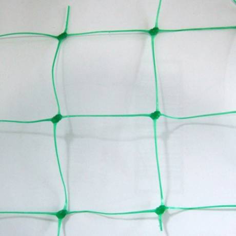 A piece of green BOP stretched netting with large mesh opening