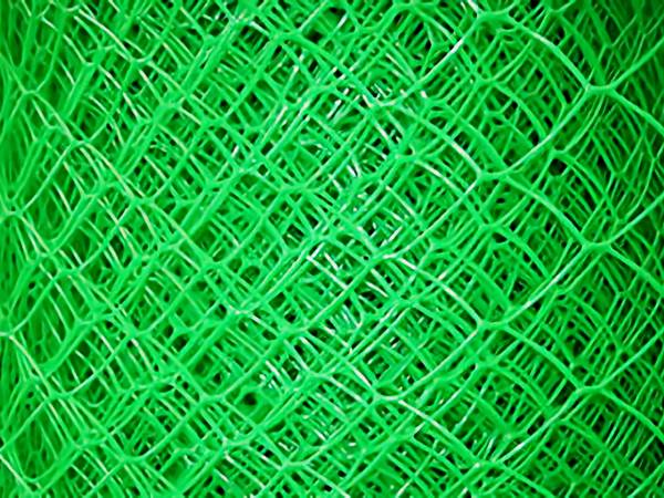 A roll of bright green diamond plastic flat mesh