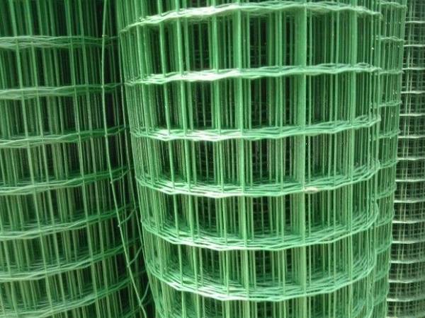 A roll of green plastic coating welded wire mesh