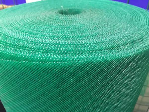 A roll of apple green extruded plastic mesh with small opening